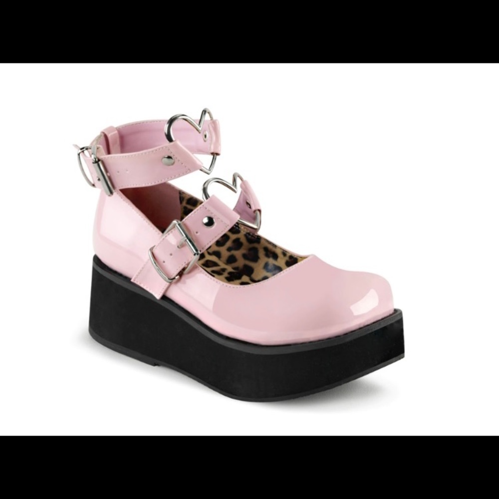 Pink platform pumps by Demonia